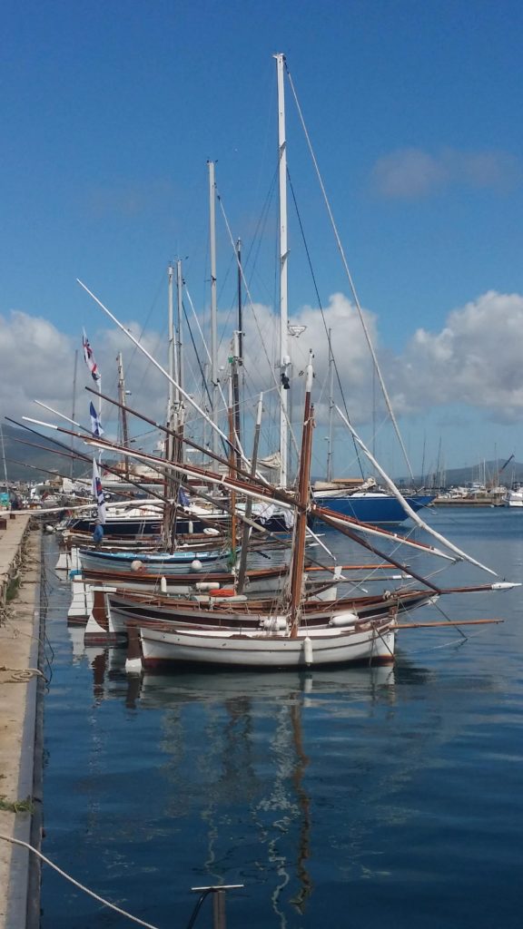 Traditional Latina Boats line up in Alghero Marina – Andrea Jensen